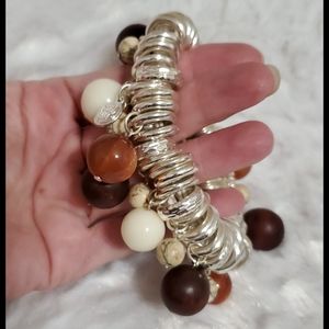 KOHL'S Silver tone beaded browns and white stretchy bracelet